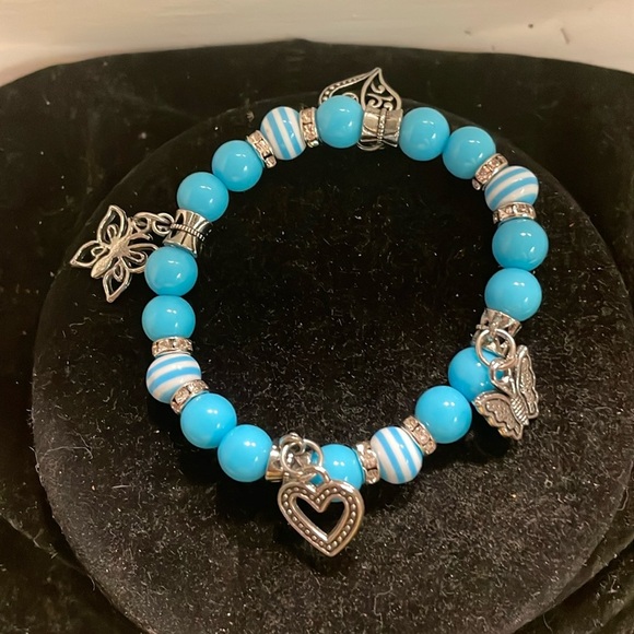 7.5” blue silver stackable stretch bracelets with 4 silver tone pendants - Picture 1 of 13